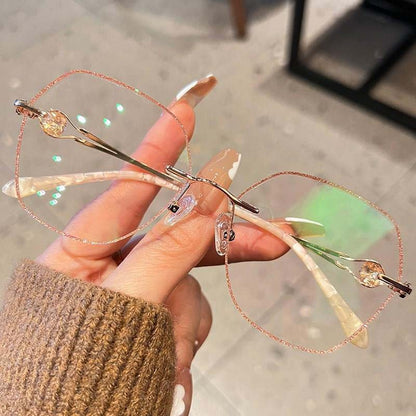 🥳Gran venta 2026🥳💞¡Se han vendido más de 50.000 piezas! ⚡Gafas anti luz azul sin montura con diamantes sintéticos para mujer