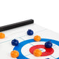 Juegos de curling sobre la mesa